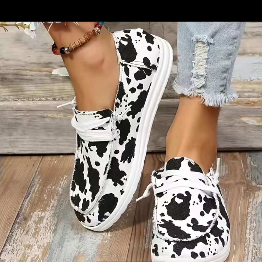 Cow Print Slip Ons